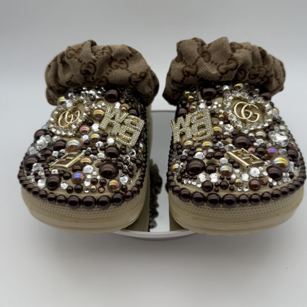 Luxury handmade brown clogs decorated with gold charms, pearls, rhinestones, and beaded embellishments for women