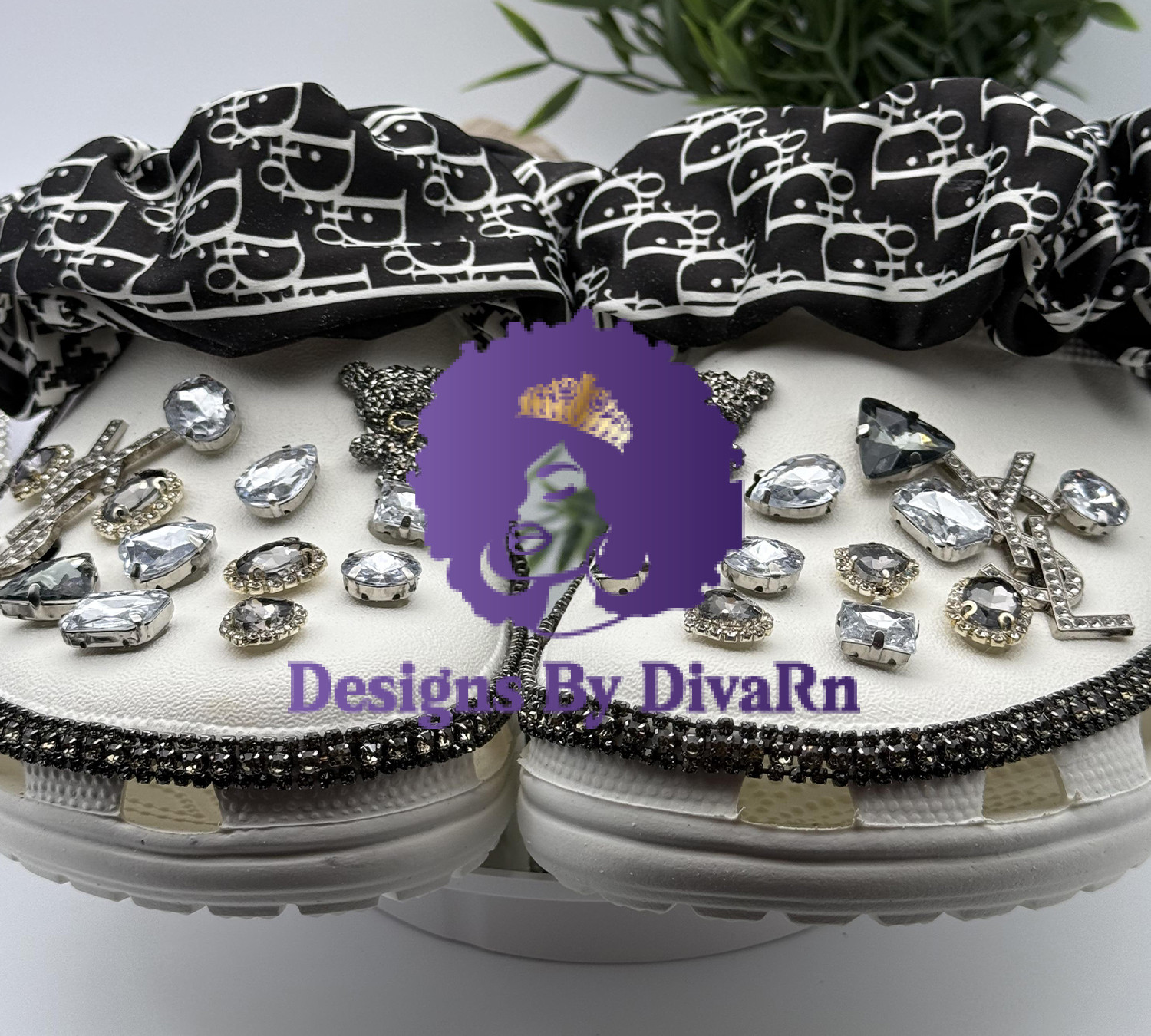 Custom white clogs with crystals and a black and white designer scrunchie.